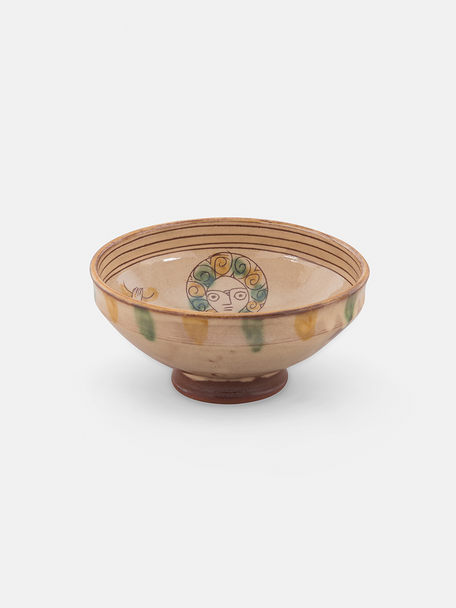 Shallow bowl with dancing figure